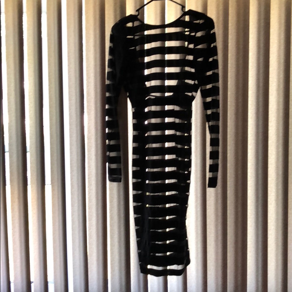 Black bodycon dress.